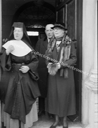 JIM NELL WILL AT DOORWAY OF BISHOP'S HOUSE